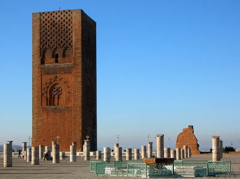 The 12th-century Hassan Tower in Rabat under a blue sky